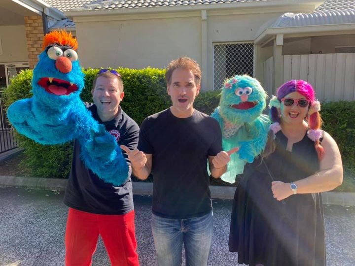 Mirror Mirror documentary - Puppet Show - Larrikin Puppets - Photo of Todd Sampson with Brett Hansen holding Troggg the puppet, left, and Elissa Jenkins holding Marina the puppet, right.