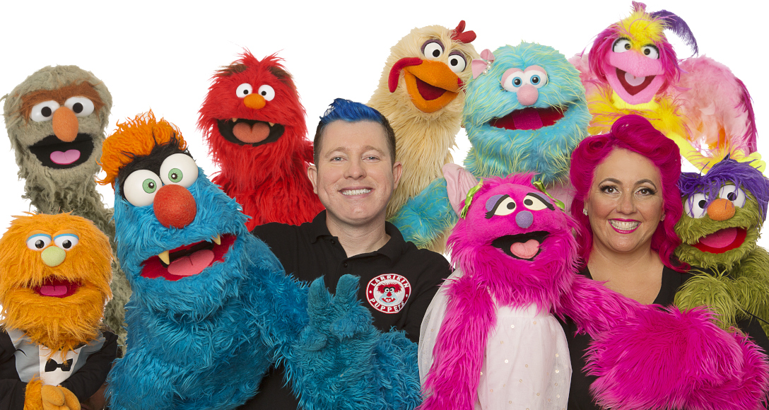 Brett with Troggg, Elissa with Marina and other puppets.
